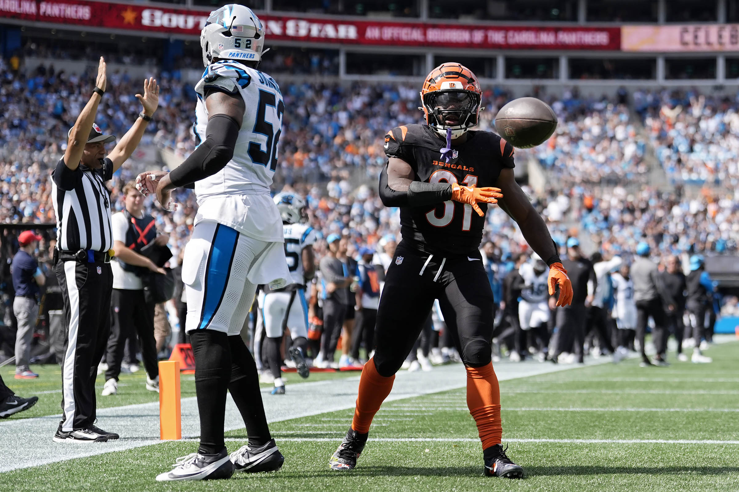 Joe Burrow throws for 2 TDs, Bengals hold on to beat Panthers 34-24 for first victory of the season