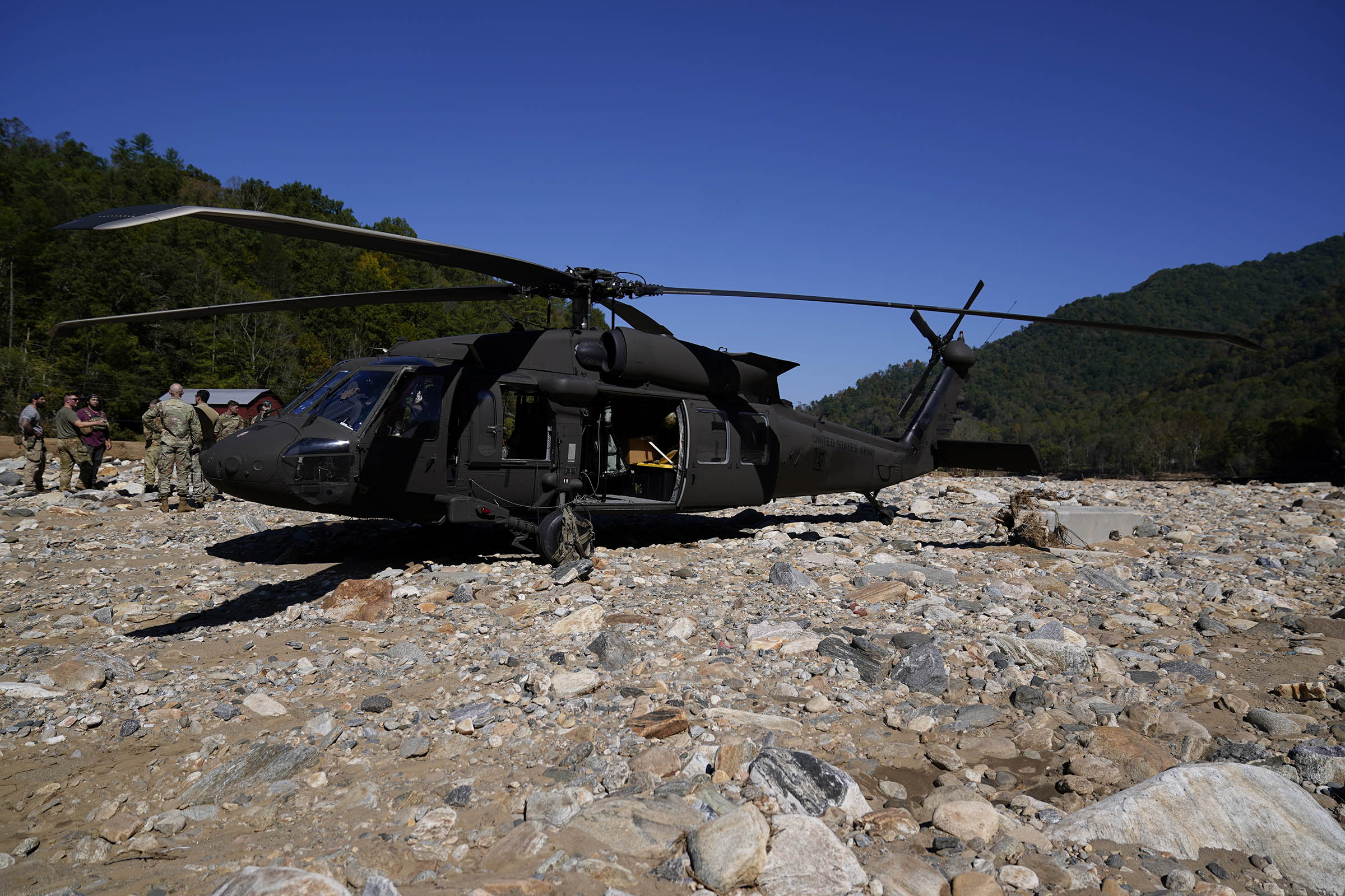 In remote mountain communities cut off by Helene, communities look to the skies for aid