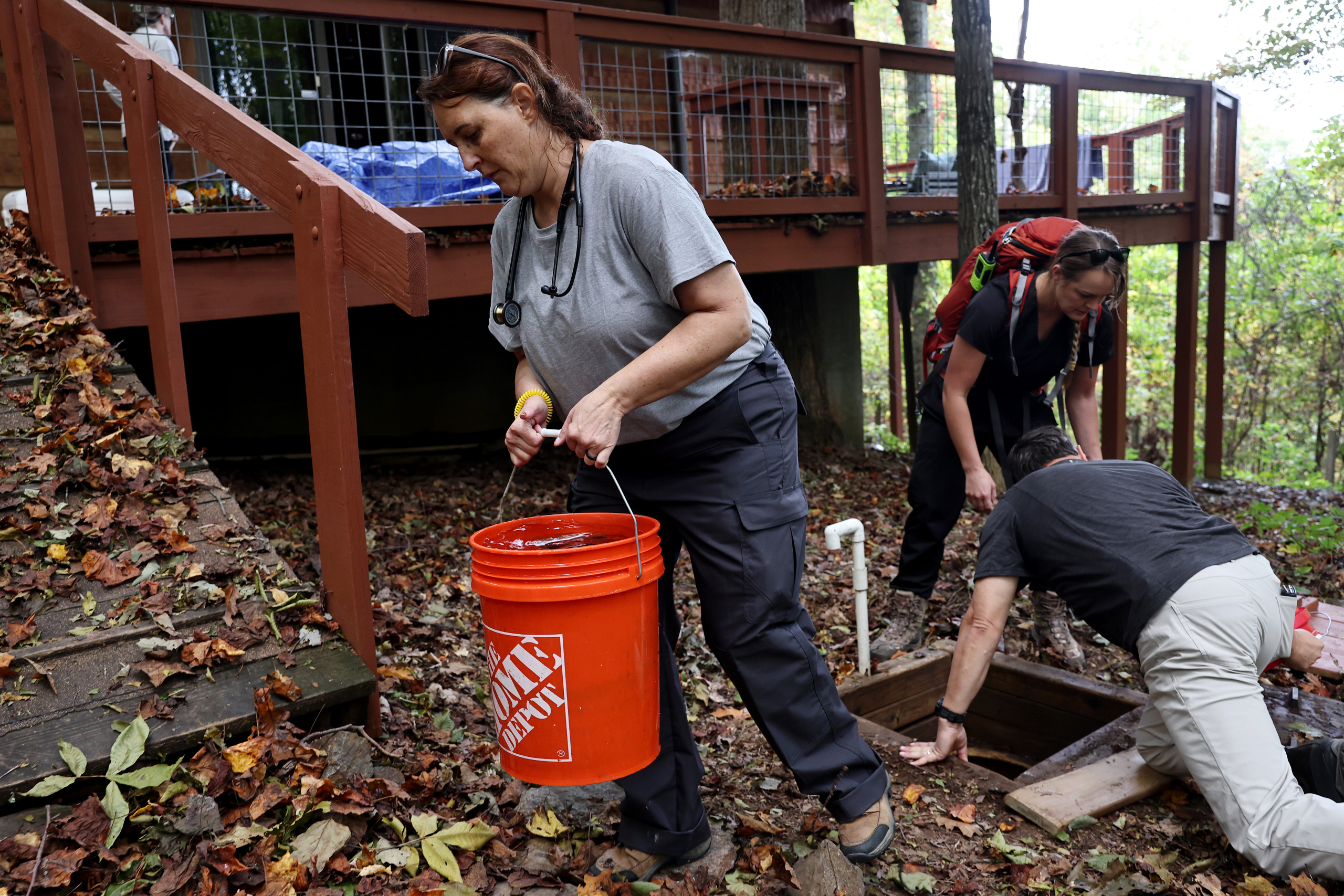 After hurricane, with no running water, residents organize to meet a basic need