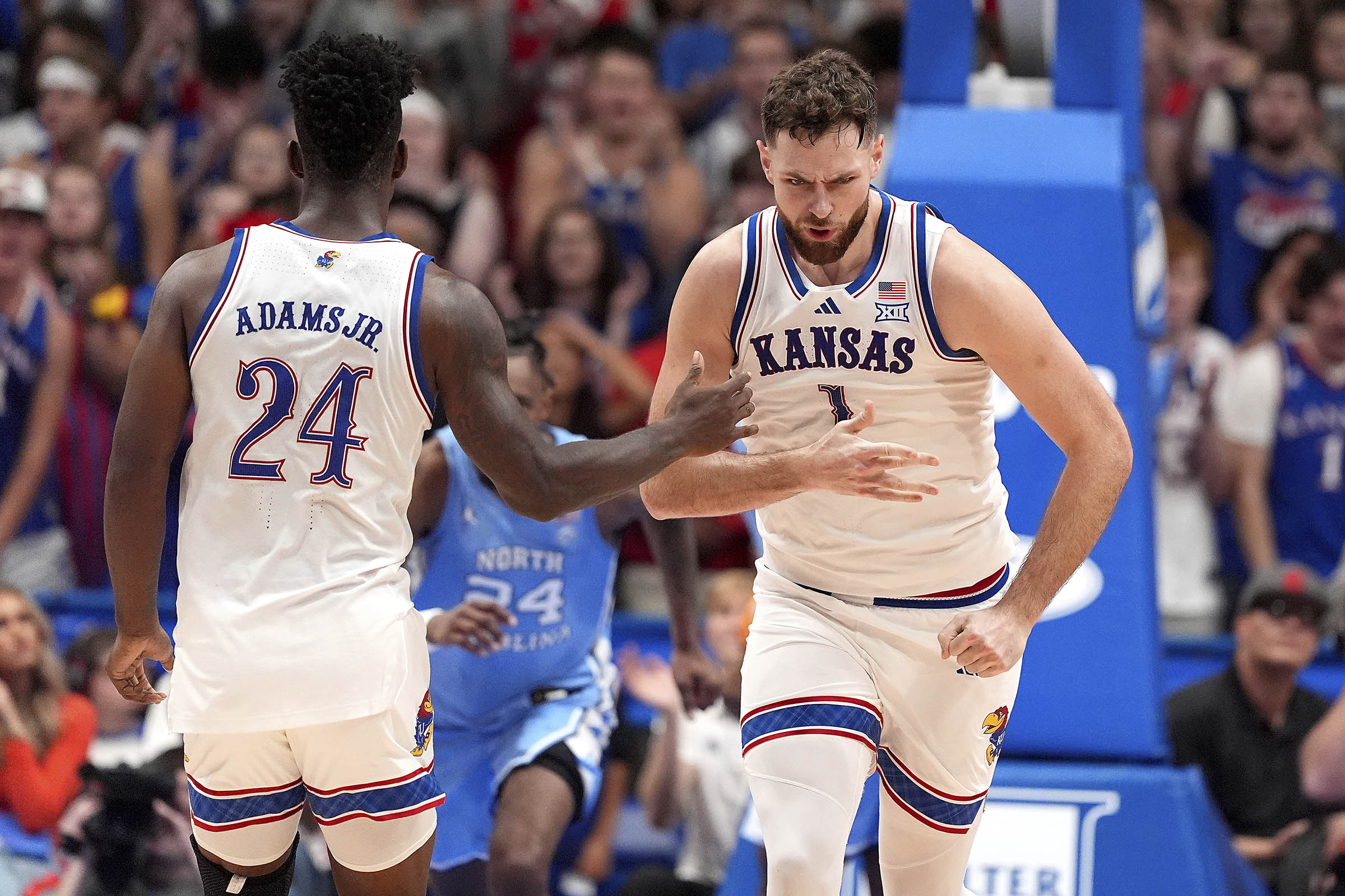 No. 1 Kansas blows big lead, holds off No. 9 North Carolina in tussle of hoops heavyweights