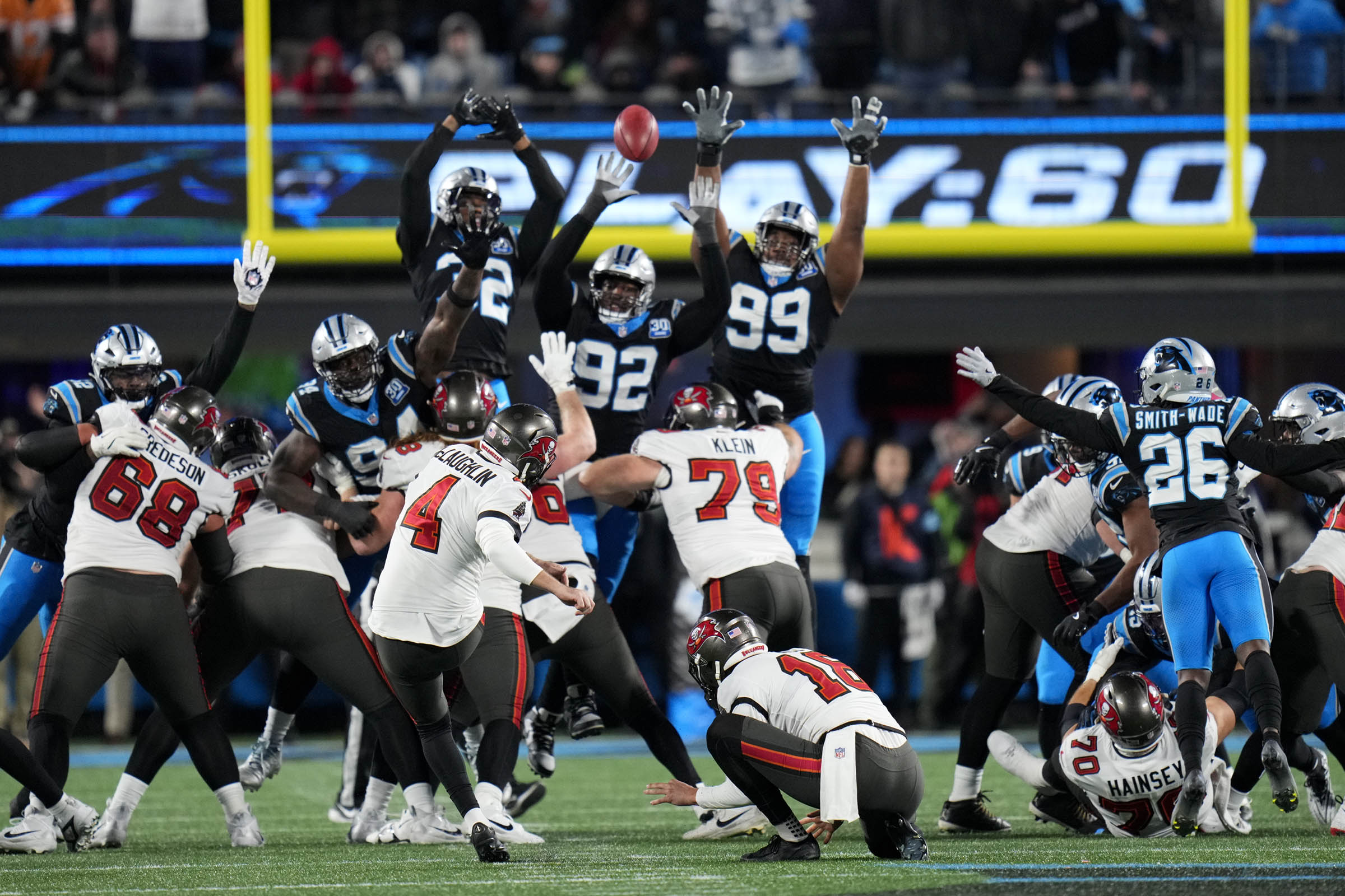 McLaughlin’s field goal in OT helps Bucs beat Panthers 26-23, move into 1st-place tie in NFC South